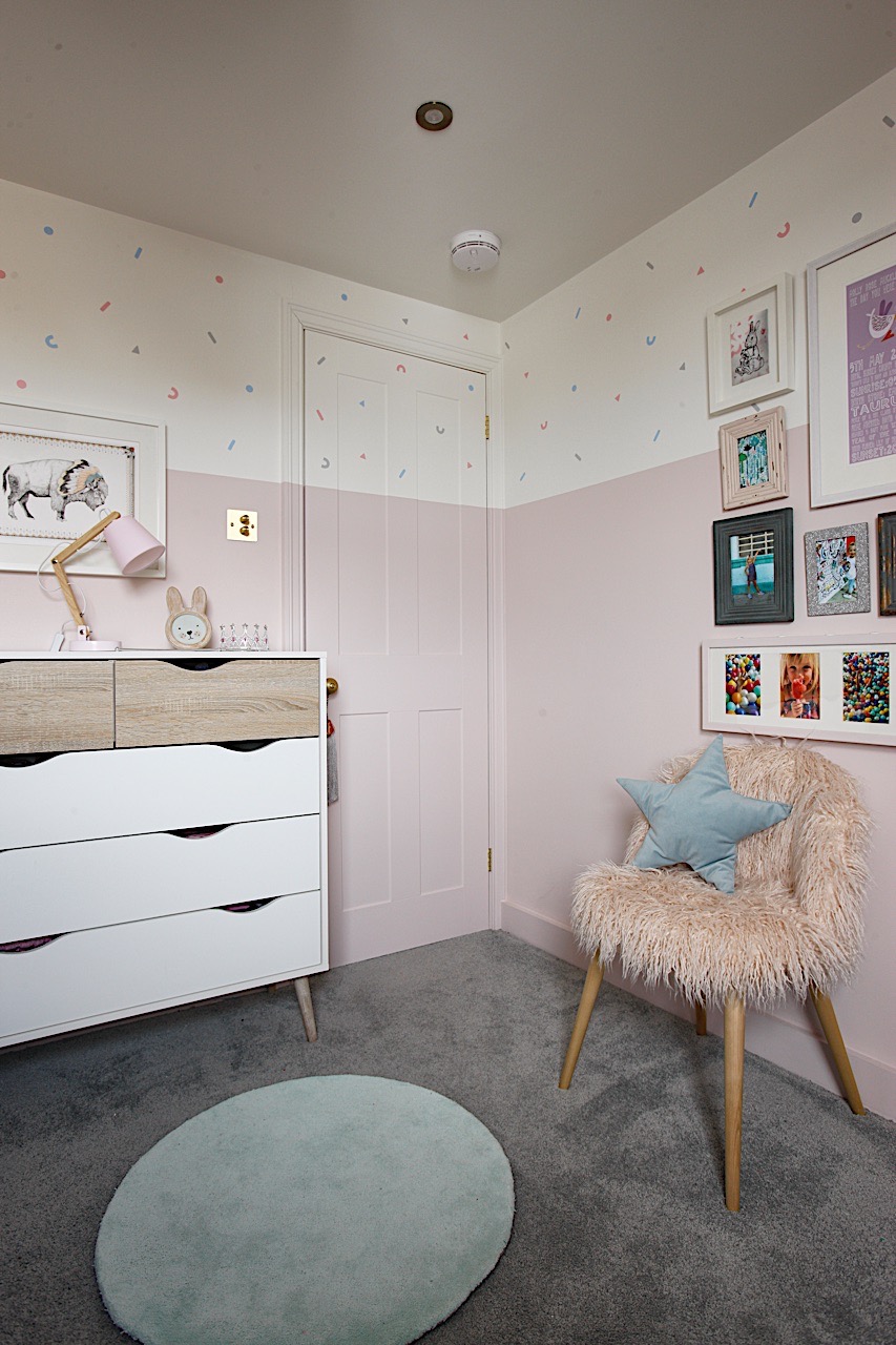 Pastel pink girls bedroom with wall decals